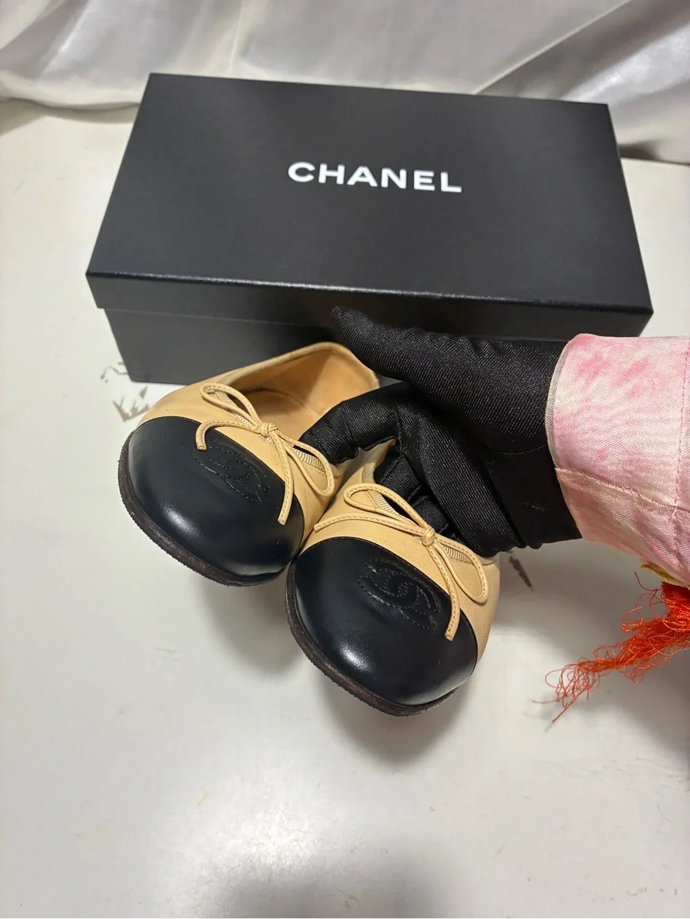 CHANEL Beige Leather Ballet Flats with Black Cap Toe